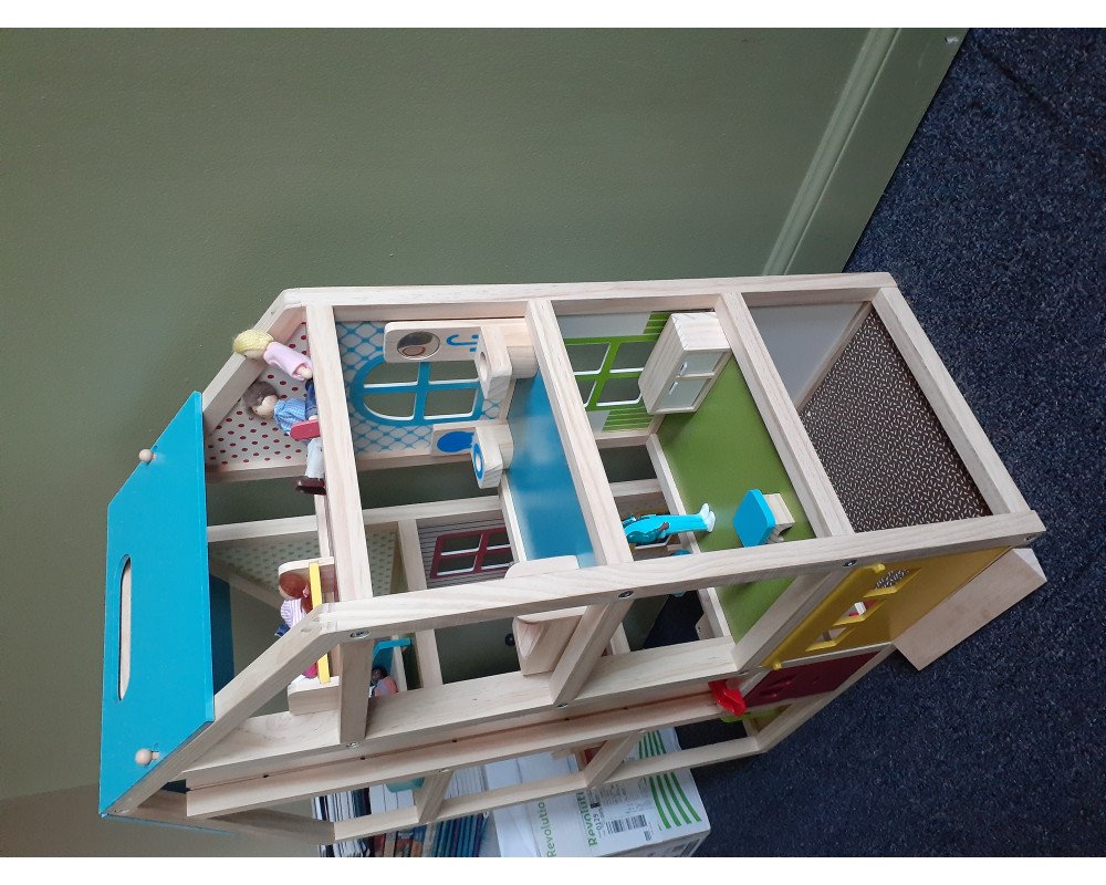 Melissa and doug high rise dollhouse deals